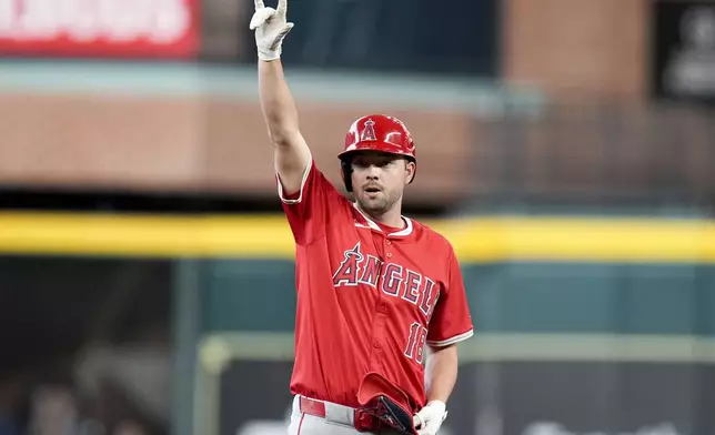 Los Angeles Angels' Nolan Schanuel reacts after hitting a double against the Houston Astros during the first inning of a baseball game, Saturday, Sept. 21, 2024, in Houston. (AP Photo/Eric Christian Smith)