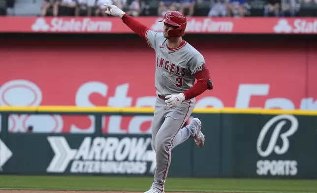 Los Angeles Angels' Taylor Ward runs the bases after hitting a home run during the first inning of a baseball game against the Texas Rangers, Saturday, Sept. 7, 2024, in Arlington, Texas. (AP Photo/LM Otero)