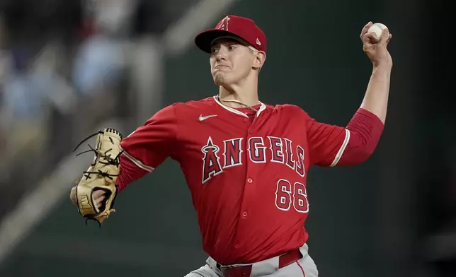 Los Angeles Angels starting pitcher Samuel Aldegheri throws to the Texas Rangers in the first inning of a baseball game Friday, Sept. 6, 2024, in Arlington, Texas. (AP Photo/Tony Gutierrez)