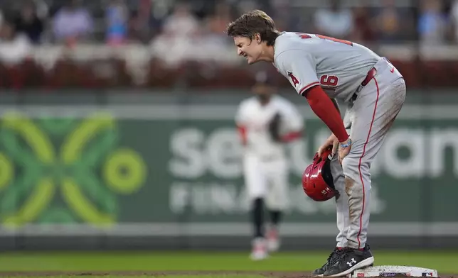 Los Angeles Angels' Mickey Moniak reacts after being caught trying to steal second base during the fifth inning of a baseball game against the Minnesota Twins, Wednesday, Sept. 11, 2024, in Minneapolis. (AP Photo/Abbie Parr)