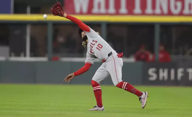 Los Angeles Angels' Jack López misses a pop-up by Chicago White Sox's Luis Robert Jr. during the eighth inning of a baseball game, Tuesday, Sept. 24, 2024, in Chicago. (AP Photo/Melissa Tamez)