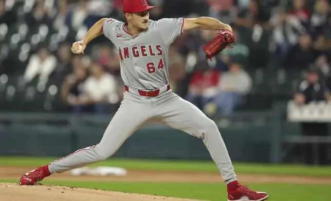 Los Angeles Angels starting pitcher Jack Kochanowicz throws during the first inning of a baseball game against the Chicago White Sox, Tuesday, Sept. 24, 2024, in Chicago. (AP Photo/Melissa Tamez)