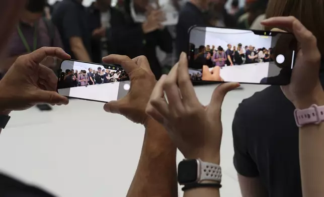 The new iPhone 16 is displayed at Apple headquarters Monday, Sept. 9, 2024, in Cupertino, Calif. (AP Photo/Juliana Yamada)