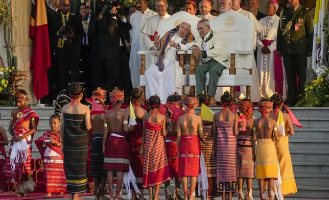 Pope Francis and East Timor's President José Manuel Ramos-Horta, right, sit as they attend a welcome ceremony outside the Presidential Palace in Dili, East Timor, Monday, Sept. 9, 2024. In East Timor Francis had to negotiate perhaps the most sensitive issue clouding the visit to Asia and Oceania: the case of Bishop Carlos Ximenes Belo, the revered national hero who won the Nobel Peace Prize for his nonviolent independence campaign. (AP Photo/Gregorio Borgia)