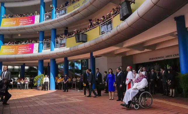 Pope Francis attends an interreligious meeting with young people at the Catholic Junior College in Singapore, Friday, Sept. 13, 2024. In Singapore, his final stop of an 11-day trip to Asia and Oceania, Francis once again ditched his remarks when he arrived at the last event, a meeting of Singaporean youth on Friday morning. "That's the talk I prepared," he said, pointing to his speech and then launching into a spontaneous back-and-forth with the young people about the need to have courage and take risks. (AP Photo/Gregorio Borgia)