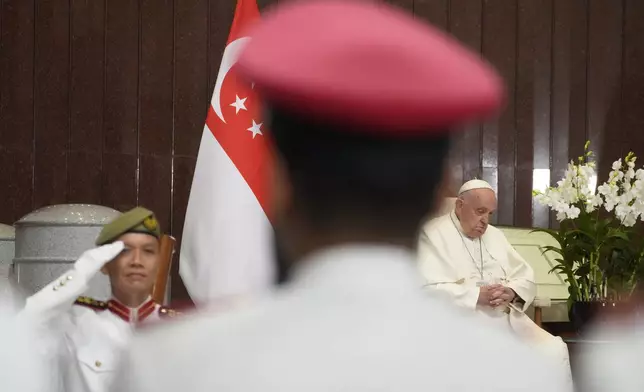 Pope Francis attends a welcome ceremony at the Parliament House in Singapore, Thursday, Sept. 12, 2024. (AP Photo/Gregorio Borgia)