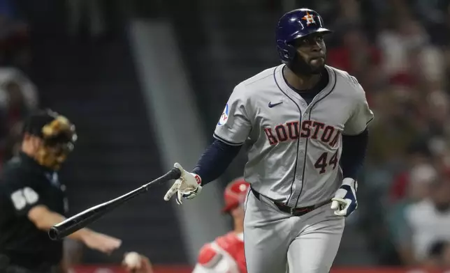 Houston Astros designated hitter Yordan Alvarez runs the bases after hitting a home run during the fifth inning of a baseball game against the Los Angeles Angels in Anaheim, Calif., Saturday, Sept. 14, 2024. Jose Altuve also scored. (AP Photo/Ashley Landis)