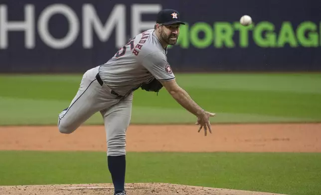 Houston Astros starting pitcher Justin Verlander delivers against the Cleveland Guardians during the first inning of a baseball game in Cleveland, Saturday, Sept. 28, 2024. (AP Photo/Phil Long)