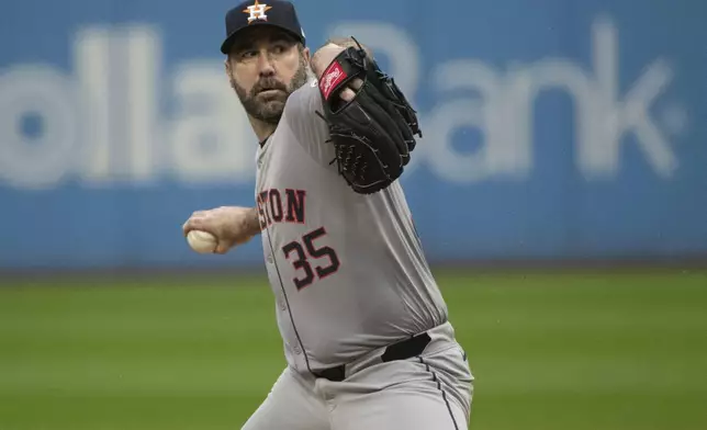 Houston Astros starting pitcher Justin Verlander delivers against the Cleveland Guardians during the first inning of a baseball game in Cleveland, Saturday, Sept. 28, 2024. (AP Photo/Phil Long)