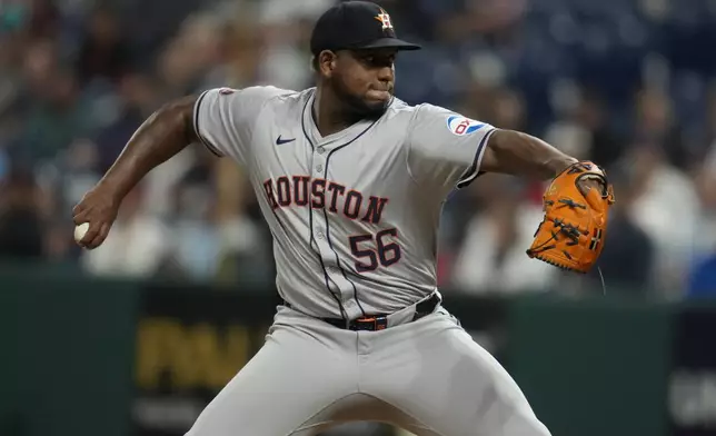 Houston Astros' Ronel Blanco pitches in the first inning of a baseball game against the Cleveland Guardians in Cleveland, Friday, Sept. 27, 2024. (AP Photo/Sue Ogrocki)