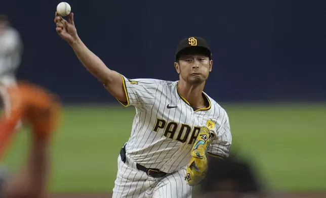 San Diego Padres starting pitcher Yu Darvish works against a Houston Astros batter during the first inning of a baseball game Monday, Sept. 16, 2024, in San Diego. (AP Photo/Gregory Bull)