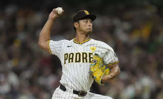 San Diego Padres starting pitcher Yu Darvish works against a Houston Astros batter during the first inning of a baseball game Monday, Sept. 16, 2024, in San Diego. (AP Photo/Gregory Bull)