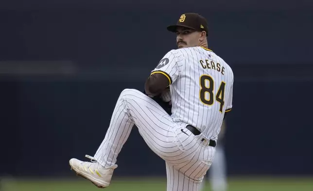 San Diego Padres starting pitcher Dylan Cease works against a Houston Astros batter during the first inning of a baseball game Wednesday, Sept. 18, 2024, in San Diego. (AP Photo/Gregory Bull)