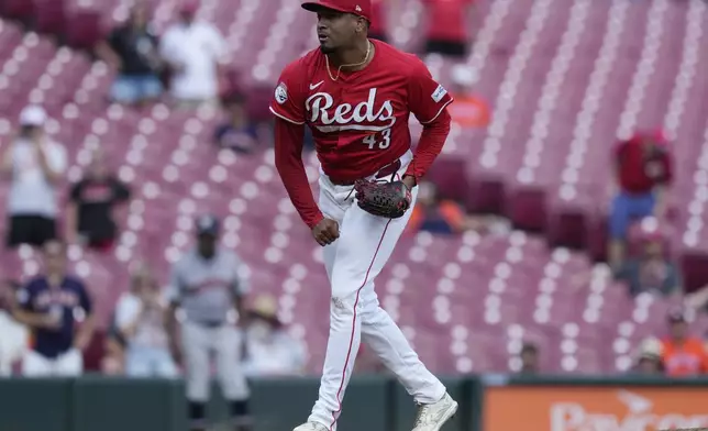 Cincinnati Reds pitcher Alexis Díaz reacts as Houston Astros' Ben Gamel strikes out swinging for the final out in the ninth inning of a baseball game, Thursday, Sept. 5, 2024, in Cincinnati. (AP Photo/Carolyn Kaster)