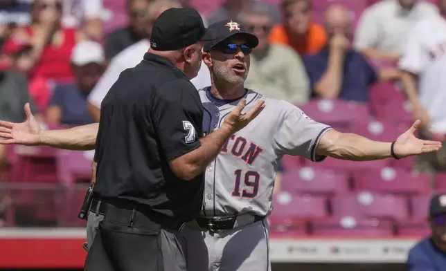 Houston Astros manager Joe Espada (19) reacts to being ejected by home plate umpire Brian O'Nora during the fourth inning of a baseball game against the Cincinnati Reds, Thursday, Sept. 5, 2024, in Cincinnati. (AP Photo/Carolyn Kaster)