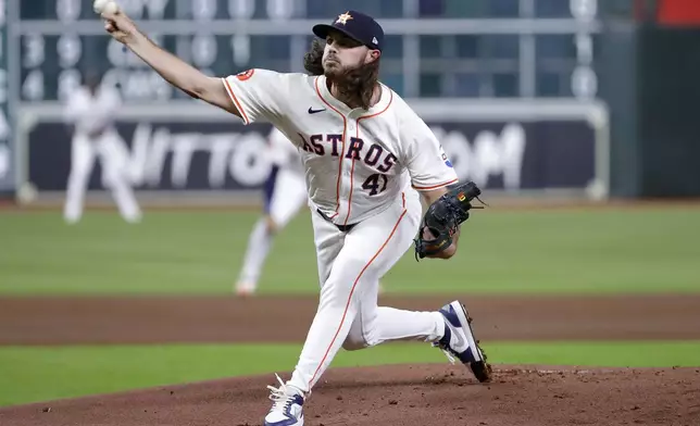 Houston Astros starting pitcher Spencer Arrighetti throws against the Oakland Athletics during the first inning of a baseball game Tuesday, Sept. 10, 2024, in Houston. (AP Photo/Michael Wyke)