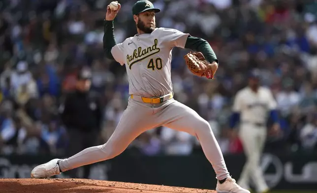 Oakland Athletics starting pitcher Mitch Spence throws against the Seattle Mariners during the second inning of a baseball game, Sunday, Sept. 29, 2024, in Seattle. (AP Photo/Lindsey Wasson)