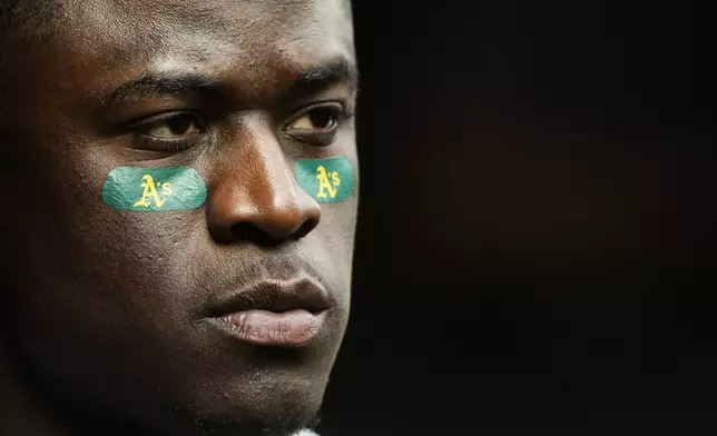 Oakland Athletics' Daz Cameron stands in the dugout during the first inning of a baseball game against the Seattle Mariners, Sunday, Sept. 29, 2024, in Seattle. (AP Photo/Lindsey Wasson)