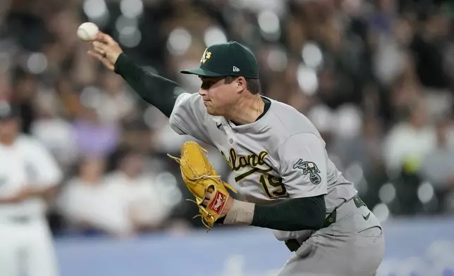 Oakland Athletics relief pitcher Mason Miller delivers during the ninth inning of a baseball game against the Chicago White Sox on Friday, Sept. 13, 2024, in Chicago. (AP Photo/Charles Rex Arbogast)