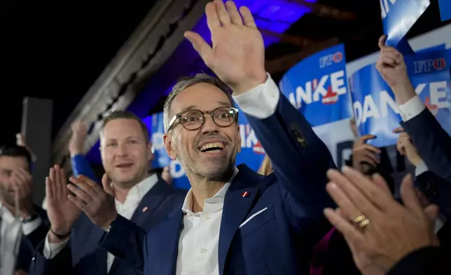 Herbert Kickl, leader of the Freedom Party of Austria waves to supporters, in Vienna, Austria, Sunday, Sept. 29, 2024, after polls closed in the country's national election. (AP Photo/Andreea Alexandru)