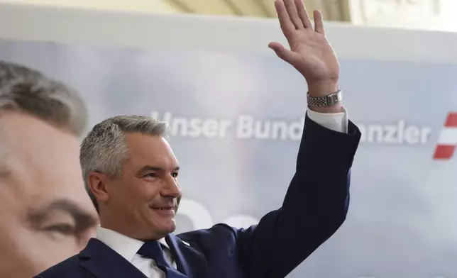 Austrian Chancellor Karl Nehammer of the People's Party attends his final election rally in Vienna, Austria, Friday, Sept. 27, 2024. (AP Photo/Heinz-Peter Bader)