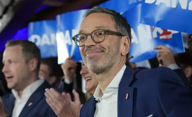 Herbert Kickl, leader of the Freedom Party of Austria celebrates with supporters, in Vienna, Austria, Sunday, Sept. 29, 2024, after polls closed in the country's national election. (AP Photo/Andreea Alexandru)