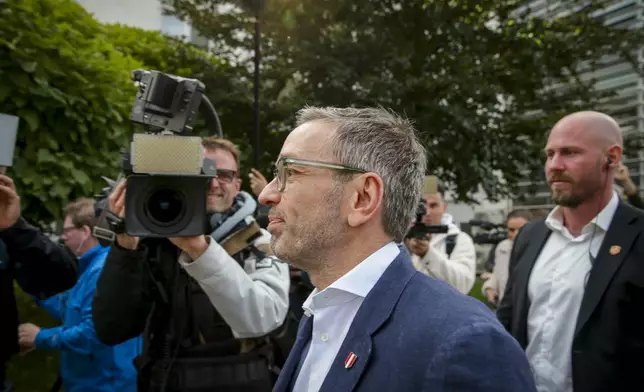 Herbert Kickl, leader of the Freedom Party of Austria arrives at a polling station in Purkersdorf, Austria, Sunday, Sept. 29, 2024, to cast his vote in the country's national election. (AP Photo/Heinz-Peter Bader)