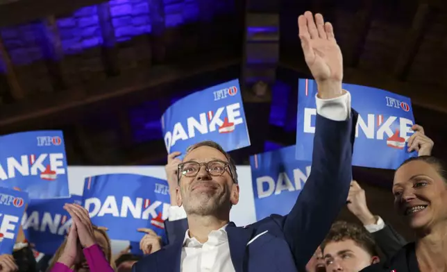 Herbert Kickl, leader of the Freedom Party of Austria waves to supporters, in Vienna, Austria, Sunday, Sept. 29, 2024, after polls closed in the country's national election. (AP Photo/Heinz-Peter Bader)