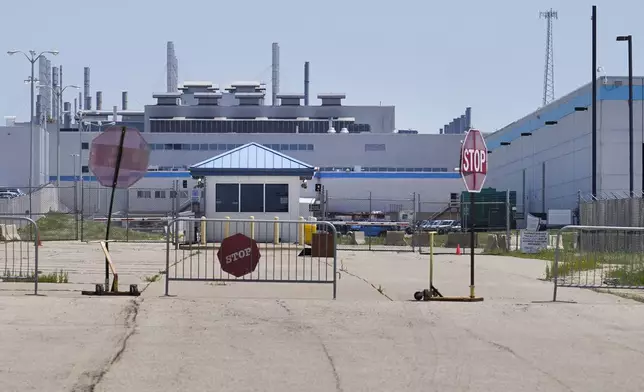 FILE - An entrance to the Stellantis factory in Belvidere. Ill., is shown on July 10, 2023. (AP Photo/Charles Rex Arbogast, File)