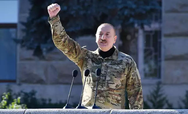 FILE - In this photo provided by the Azerbaijan's Presidential Press Office, Azerbaijani President Ilham Aliyev speaks at a parade in Khankendi, capital of the former breakaway territory of Karabakh, Azerbaijan, on Nov. 8, 2023. (Azerbaijani Presidential Press Office via AP, File)