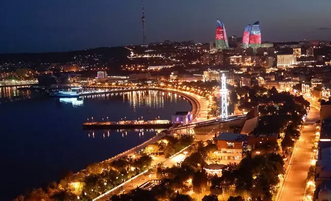 FILE - This file photo shows a general view of the city center of Baku, Azerbaijan’s capital, on June 22, 2017. (AP Photo/Efrem Lukatsky, File)