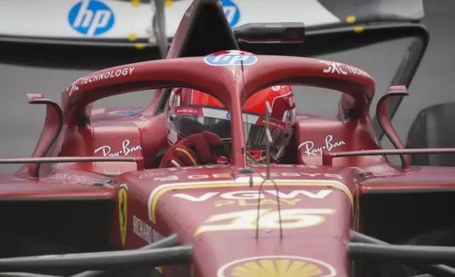 Ferrari driver Charles Leclerc of Monaco in action during a Formula One Grand Prix qualifying in Baku, Azerbaijan, on Saturday, Sept. 14, 2024. (AP Photo/Sergei Grits)