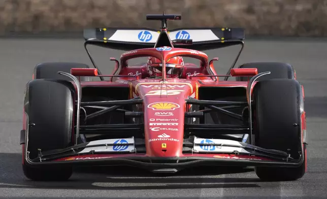 Ferrari driver Charles Leclerc of Monaco in action during a Formula One Grand Prix qualifying in Baku, Azerbaijan, on Saturday, Sept. 14, 2024. (AP Photo/Sergei Grits)