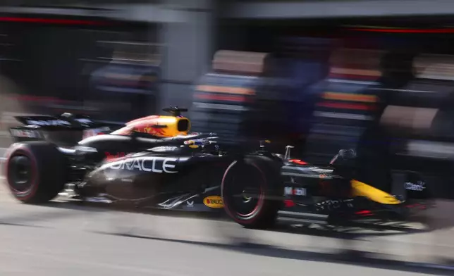 Red Bull driver Max Verstappen of the Netherlands enters the pit lane during the Formula One Grand Prix qualifying in Baku, Azerbaijan, on Saturday, Sept. 14, 2024. (Ali Haideric/Pool via AP)