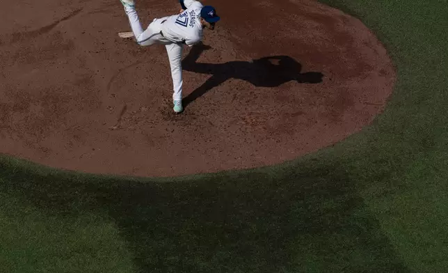 José Berríos of the Toronto Blue Jays throws a pitch against the St. Louis Cardinals during fourth inning interleague MLB baseball action in Toronto, Saturday Sept. 14, 2024. (Paige Taylor White/The Canadian Press via AP)