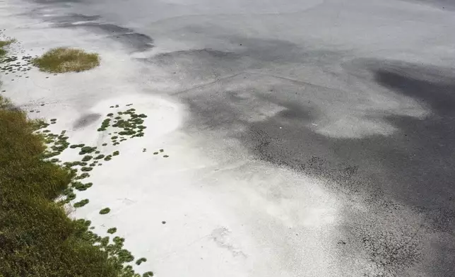 The Rusanda salty lake, of which its mud is used in medical therapy, has dried out completely, near Melenci, Serbia, Wednesday, Sept. 4, 2024. Experts say the summer of 2024 in the Balkans was the hottest since measurements started more than 130 years ago. (AP Photo/Darko Vojinovic)