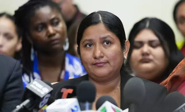 Maria del Carmen Castellón, the wife of Miguel Luna, a welder who died during the collapse of Baltimore's Francis Scott Key Bridge, speaks during a press conference, Tuesday, Sept. 17, 2024, in Baltimore. (AP Photo/Stephanie Scarbrough)