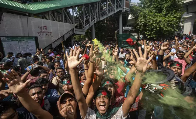 FILE- Protesters shout slogans as they celebrate Prime Minister Sheikh Hasina's resignation, in Dhaka, Bangladesh, Aug. 5, 2024. (AP Photo/Rajib Dhar, File)