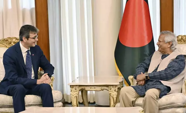 This photo handed out provided by Bangladesh Press Information Department (PID) shows Brent Neiman, US Assistant Secretary of the Treasury for International Finance and Development, left, speaking with Muhammad Yunus, Bangladesh's interim government's leader, in Dhaka, Bangladesh, Sunday, Sep. 15, 2024. (PID via AP)