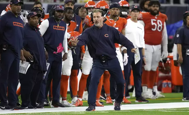 Chicago Bears head coach Matt Eberflus throws a challenge flag during the second half of an NFL football game against the Houston Texans Sunday, Sept. 15, 2024, in Houston. (AP Photo/Eric Christian Smith)