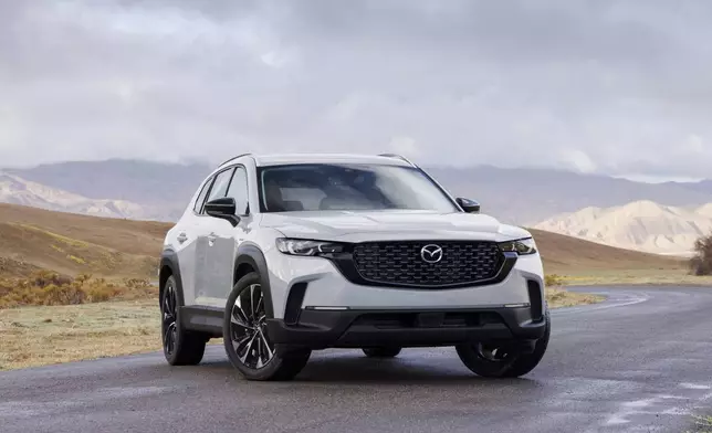 This photo provided by Mazda shows the 2025 CX-50. It receives a new hybrid powertrain option that will get close to 40 mpg. (Courtesy of Mazda North American Operations via AP)