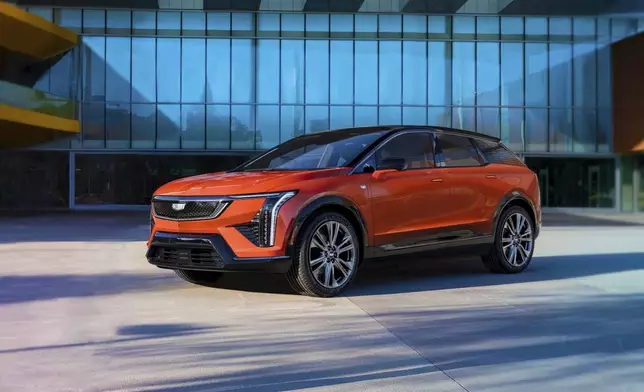 This photo provided by Cadillac shows the 2025 Optiq. A small crossover SUV, the new Optiq is fully electric and comes standard with a hands-free driving feature. (Courtesy of General Motors via AP)