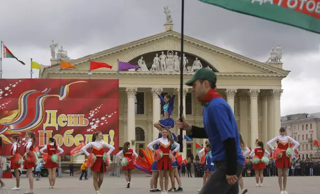 FILE - Schoolchildren perform at a ceremony marking Belarus’ holiday honoring the state flag and emblem in Minsk, Belarus, on May 13, 2012. (AP Photo, File)