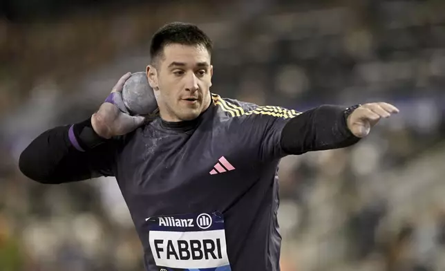 Leonardo Fabbri, of Italy, makes an attempt in the men's shot put during the Diamond League final 2024 athletics meet in Brussels, Saturday, Sept. 14, 2024. (AP Photo/Frederic Sierakowski)