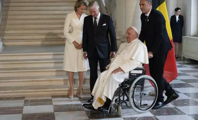 Pope Francis meets with King Philippe and Queen Mathilde in the Castle of Laeken, Brussels, Friday, Sept. 27, 2024. (AP Photo/Andrew Medichini)