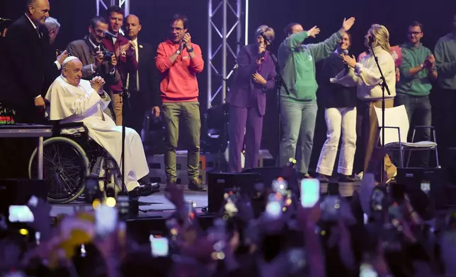 Pope Francis attends the Hope Happening youth festival at the Brussels Expo, Belgium, Saturday, Sept. 28, 2024, on the third day of his four-day visit to Luxembourg and Belgium. (AP Photo/Andrew Medichini)