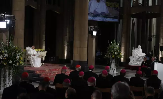 Pope Francis delivers his message during a meeting with bishops, deacons, and religious people in Koekelberg Basilica of the Sacred Heart, in Koekelberg, Belgium, Saturday Sept. 28, 2024. (AP Photo/Omar Havana)