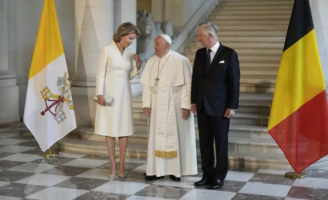 Pope Francis meets with King Philippe and Queen Mathilde in the Castle of Laeken, Brussels, Friday, Sept. 27, 2024. (AP Photo/Andrew Medichini)