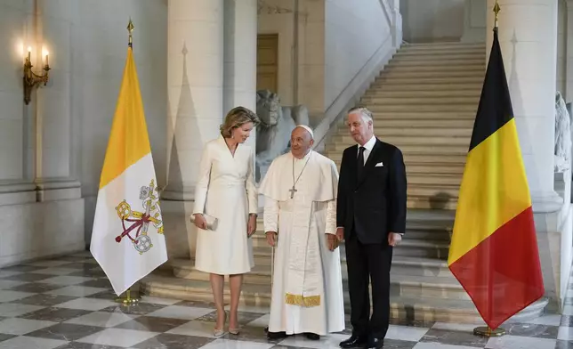 Pope Francis meets with King Philippe and Queen Mathilde in the Castle of Laeken, Brussels, Friday, Sept. 27, 2024. (AP Photo/Andrew Medichini)