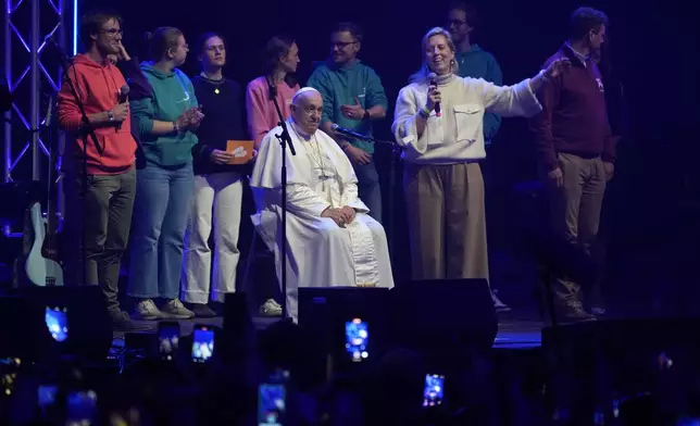 Pope Francis attends the Hope Happening youth festival at the Brussels Expo, Belgium, Saturday, Sept. 28, 2024, on the third day of his four-day visit to Luxembourg and Belgium. (AP Photo/Andrew Medichini)